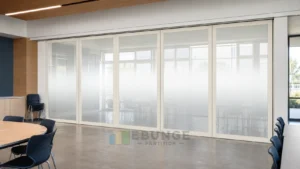 EBUNGE framed movable glass partition concept for school multipurpose room warm white