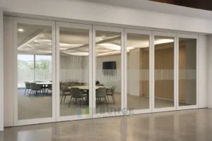 EBUNGE framed movable glass partition concept for convention breakout room warm white