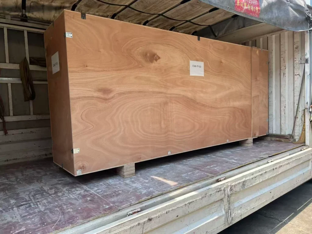 First-party EBUNGE export crate loaded on a delivery truck
